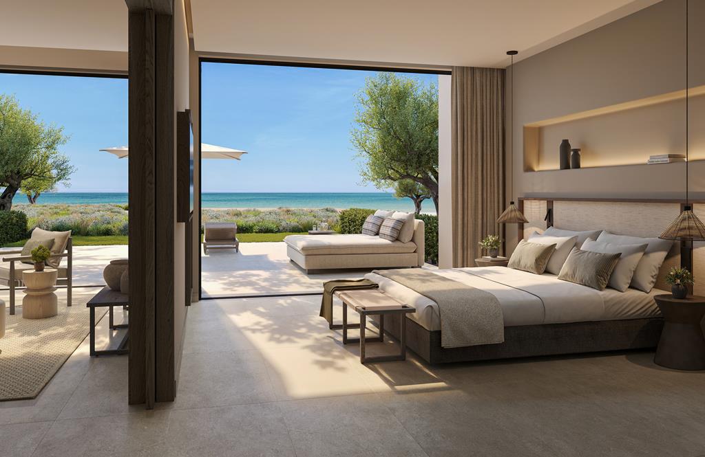 Stijlvolle hotelkamer met uitzicht op zee en lounge terras